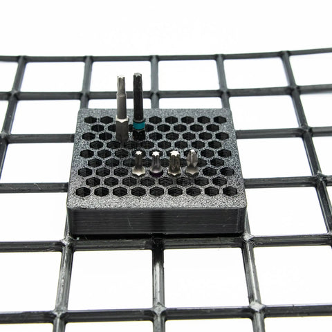 Modular 1/4-Inch Hex Bit Organizer System With 77 Slots For Fast Access Driver Bit Holder For Toolbox And Workbench Storage Gridfinity Compatible Black Finish 84 mm By 84 mm on grid surface