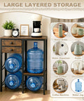 5 Gallon Water Jug Holder With 4 Slots Sturdy Water Dispenser Stand With Drawers And Wood Shelves in kitchen setting
