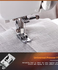 Installed universal presser foot on sewing machine, stitching gray fabric
