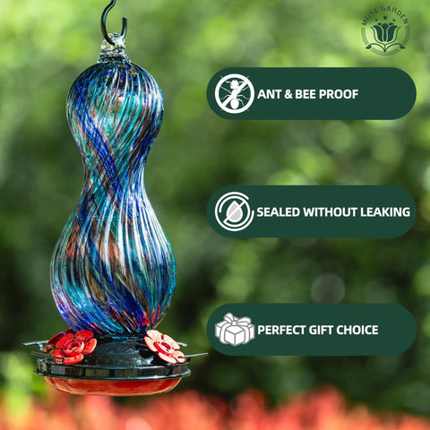 Outdoor Hand Blown Glass Hummingbird Feeder With 24 Oz Capacity And Four Feeding Ports, colorful glass hanging in a garden setting