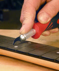 Fret Slot Cleaning Tool With Replaceable Chisel Blades For Luthiers And Guitar Repair used on guitar fretboard