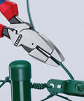 Ultra-High Leverage 9 1/4 Inch Lineman Pliers With Fish Tape Puller And Crimper cutting wire on a green fence post.