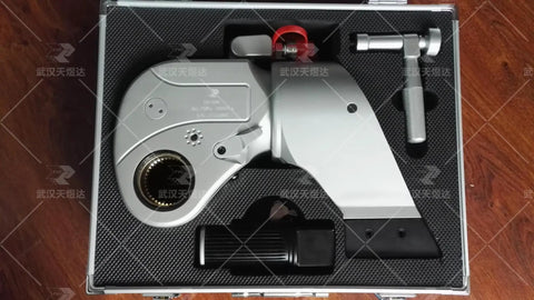 Top Shelf Hydraulic Torque Wrench With 1 1/2 Inch Drive in case, showing steel frame and accessories for stuck bolts.