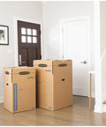 Heavy Duty Tape Free Wardrobe Moving Boxes 3 Pack With Sturdy Hanging Rail And Grippy Handles in home entryway.