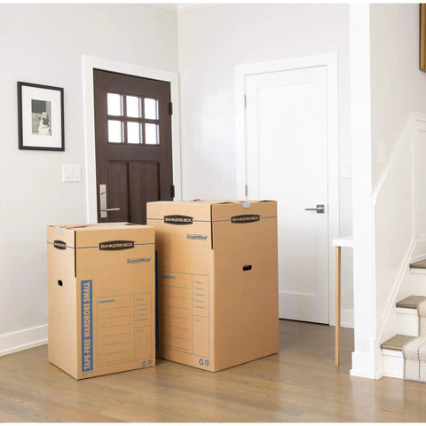 Heavy Duty Tape Free Wardrobe Moving Boxes 3 Pack With Sturdy Hanging Rail And Grippy Handles in home entryway.