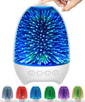 Hand touching Night Light Bluetooth Speaker With 3D Glass Fireworks Lamp, showing seven color options, on white background.