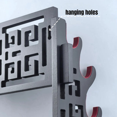 Close-up of Sword Wall Mount Katana Holder Display Stand Dope Gift For Full Tang Katana Japanese Sword Tai Chi Sword Lightsaber And Long Sword With Red Velvet Felt Pad To Protect Scabbard And Prevent Scratches showing hanging holes and intricate pattern.