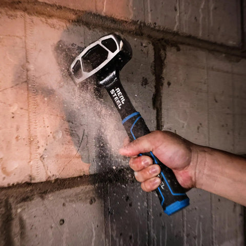 Using Drilling And Crack Hammer 3 Lb Small Sledge One Piece Forged Steel Construction Tool against concrete wall