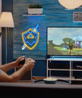 Sword and Shield LED Gaming Light for Game Room Decor, Zelda Inspired Sword and Shield Sign next to gaming setup