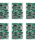 Six Pack TP4056 Battery Charger Module With Dual USB Boost Circuit For 18650 Lithium Ion Packs Quick Charge Discharge Step Up Board, green circuit boards, multiple angles.