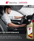 Driver in car with ATF Type TLS LV WS Automatic Transmission Fluid for Toyota Lexus Scion One Quart shown in inset bottle