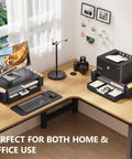 Home office setup with Ergonomic Monitor Riser With Drawer And Two Pen Holders, Printer And Laptop Stand, Black.