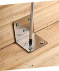 Built Tough Iron Corner Brackets For Cabinet Repair With Included Screws For Quick Diy Fixes. Close-up of screw installation.