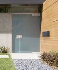 Edward Wall Mounted Mailbox In Slick Matte Black With Powder Coated Steel And Medium Capacity on modern house facade