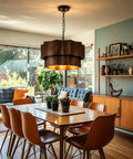 XSDeTu Farmhouse Metal Pendant Light, 2-Tier Chandeliers for Dining Room hanging above a wooden dining table in a stylish setting.