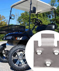 Golf Cart Seat Bottom Hinge Plate Assembly Built Tough With Rock Solid Metal Parts For Long Lasting Performance Easy Install and Durable Fit For Your Ride 71610-G01P 71609-G01P, shown next to a golf cart on a street.