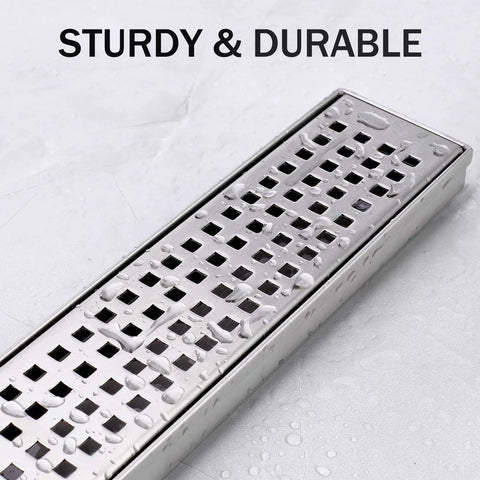 Linear Shower Drain 12 Inch With Brushed Nickel Finish 304 Stainless Steel showing water droplets on grate