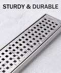 36 Inch Linear Shower Drain With Brushed Nickel Finish featuring removable grate and water droplets on 304 stainless steel surface