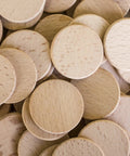 Premium Unfinished Wood Cutout Circles 1.5 Inches natural pine blanks stacked, perfect for DIY projects and crafts.