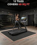 Interlocking Gym Floor Tiles 0.56 Inch Thick, 24 By 24 Inch, 12 Piece Set, EVA Foam Exercise Mats with rubber top in gym setting