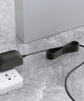 AC DC Adapter For Sewing Machines 6V Power Supply With 1.2M Cord on gray surface