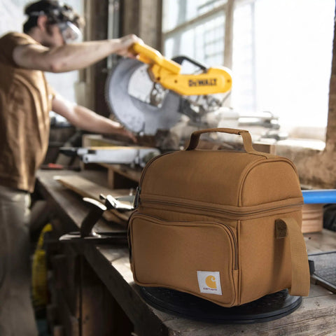 Rugged Insulated Lunch Box For Men, Soft Shell Cooler Bag Built For Camping, Worksites And Construction, in brown on workbench