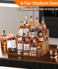 Four Tier Stadium Style Liquor Bottle Display Shelf 16 Inch Rustic Wood Rack For Bottles And Syrups on countertop with guard rails