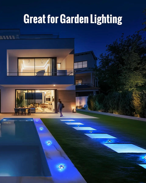 Solar Dock Lights Outdoor 12 Pack Waterproof LED Pathway Lights Dual Color Blue And White illuminating a modern patio at night