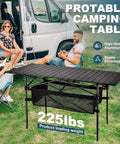 Lightweight Aluminum Folding Camping Table With Portable Roll Up Design For Outdoor Dining On The Go No Fuss Easy Setup 47 Inch By 22 Inch By 27 Inch Waterproof With Carrying Bag For Camping Beach Patio Picnic displayed with campers beside van