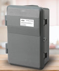 Industrial Programmable Indoor And Outdoor Timer With Solar Timetable Dual Load Control Black TI044 on wooden table