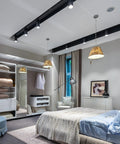 Modern bedroom with track lighting featuring Three Way LED Bulbs A19 E26 Base Daylight 5000K 50W 100W 150W Equivalents.