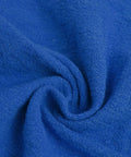 Close-up of blue Ultra Absorbent Cotton Shop Towels Pack Of 50 12 By 14 Inches Super Soft Rags For Home Garage And Auto Care.