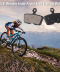 Mountain biker on trail with All In One 4 Piston Mountain Bike Brake Pads Set For Disc Brakes Includes Gap Regulator Piston Press Tool