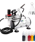 Airbrush Kit With Compressor AS18-2K Basic Start Set With Hose, Cleaning Brushes, And Test Paints For Hobby Projects shown.