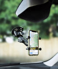 Twist Lock Suction Cup Base With B Size One Inch Ball For Phone And GPS mounted on a car windshield displaying a map.