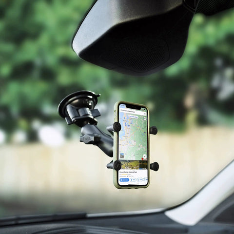 Twist Lock Suction Cup Base With B Size One Inch Ball For Phone And GPS mounted on a car windshield displaying a map.