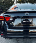 Car rear view with Carbon Fiber Look License Plate Frame Made From Durable Aluminum Scratch Resistant Metal Plate Holder
