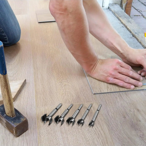 Top Shelf 5 Piece Forstner Drill Bit Set Woodworking Hinge Cutter Round Shank Multi Tooth Bits for hardwood softwood plywood on wooden floor.