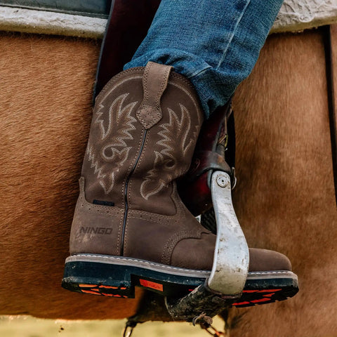 Side view of dark brown Steel Toe Western Work Boots For Men Waterproof Slip On Square Toe Safety Boots For Construction Welding Ranch And Farm Work Built For The Grind With Cushioned Insole And Stable Grip