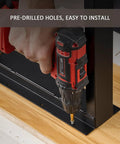 Installing black Beefy 30 Inch Metal Table Legs Set Of 2 With Adjustable Feet Pads on wooden surface using drill