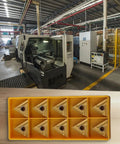 10 Pack TNMG160404R-S Carbide Turning Inserts in yellow tray, CNC lathe and milling environment in background