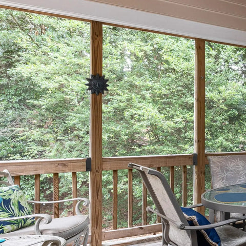 24 Pack 2x4 Deck Railing Brackets For Wood Posts - 18-Gauge Steel Black Powder Coated installed on a porch.