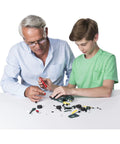 Child and adult assembling Roadster 5-In-1 Building Kit With 174 Parts, Pull-Back Racer, Real Metal Components For STEM