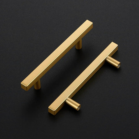Top Shelf Champagne Gold Square Cabinet Handles For Modern Kitchen Drawers Hella Strong Heavy Duty Metal Construction With Ultra Smooth Finish And Quick Install 4 Inch Spread on dark background.
