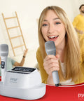 Woman using UHF Wireless Microphone System With Bluetooth Receiver, Dual Rechargeable Mics, 1200mAh Batteries in classroom setting.