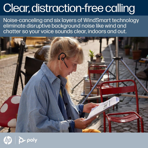 Woman using Wireless Single Ear Bluetooth Headset With Noise Canceling Microphone for clear calls outdoors