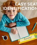 Child using 40 Pack Desk Name Plates For Classroom With Alphabet And Number Line, Traditional Manuscript Style Desk Labels For Students, 12 Inch By 3.5 Inch, Kid Friendly Classroom Organization on desk