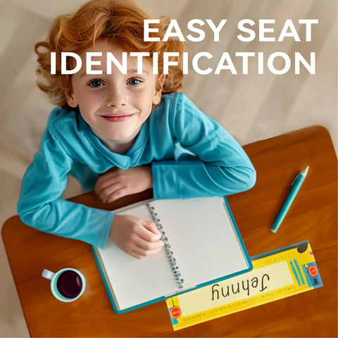 Child using 40 Pack Desk Name Plates For Classroom With Alphabet And Number Line, Traditional Manuscript Style Desk Labels For Students, 12 Inch By 3.5 Inch, Kid Friendly Classroom Organization on desk