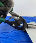 Midwest Blackout aviation tin snips, side view with green handle, cutting sheet metal.