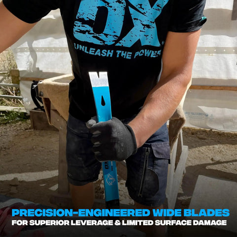 Person using 21 Inch Flat Pry Bar With Heat Treated Forged Steel Construction And Powder Coated Finish A Long Crowbar Tool For Demolition